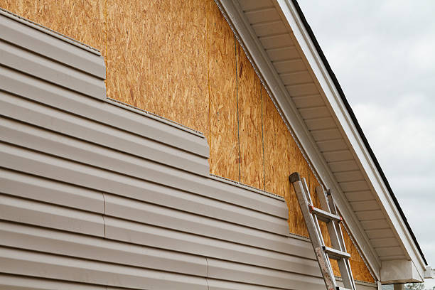Professional Emergency Siding Repair technician working in Mascot, VA